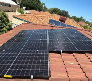 Residential solar panels installed on a rooftop by Fortune Solar